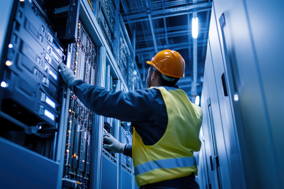 Technician maintaining secure web servers and website hosting infrastructure.